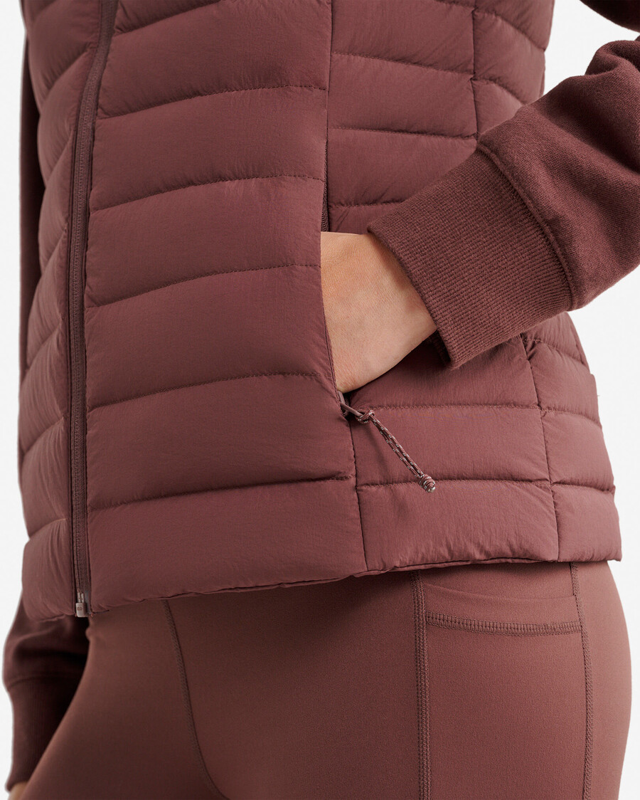 gilet de rangement roots down